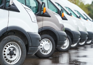 white vans parked in lot
